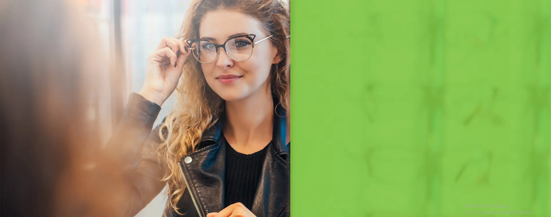 Woman trying on glasses for the first time to correct her blurring of vision