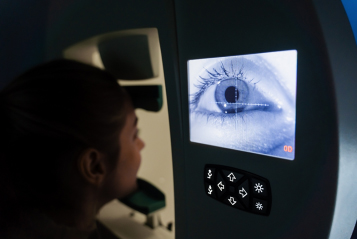 Patient undergoing perimetry for showing symptoms like blurring of vision and seeing black dots