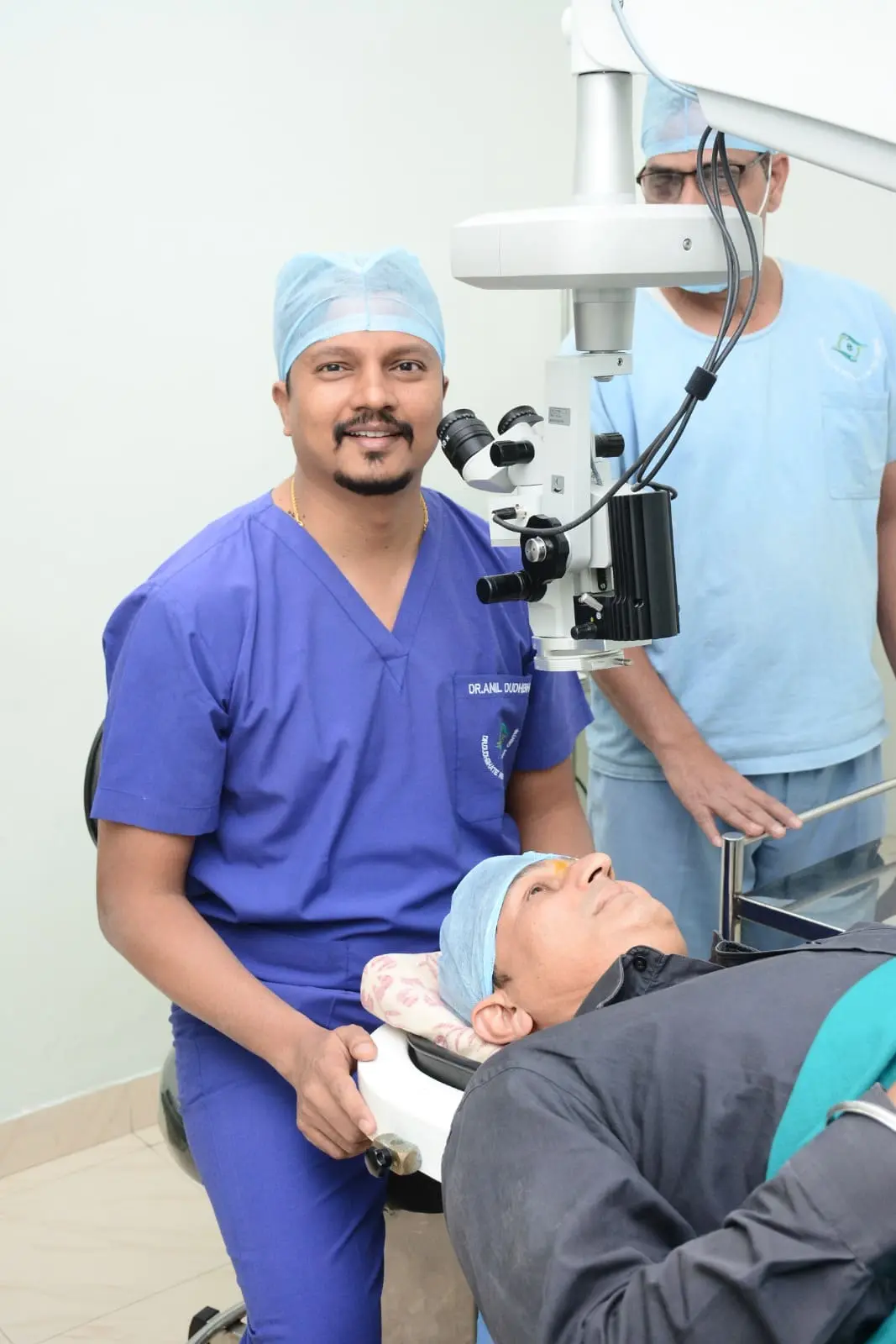 Doctor Anil Dudhbhate examining patient's eye before surgery at Dr.DudhbhateNetralay and Retina Centre, the best Eye Clinic Near Me